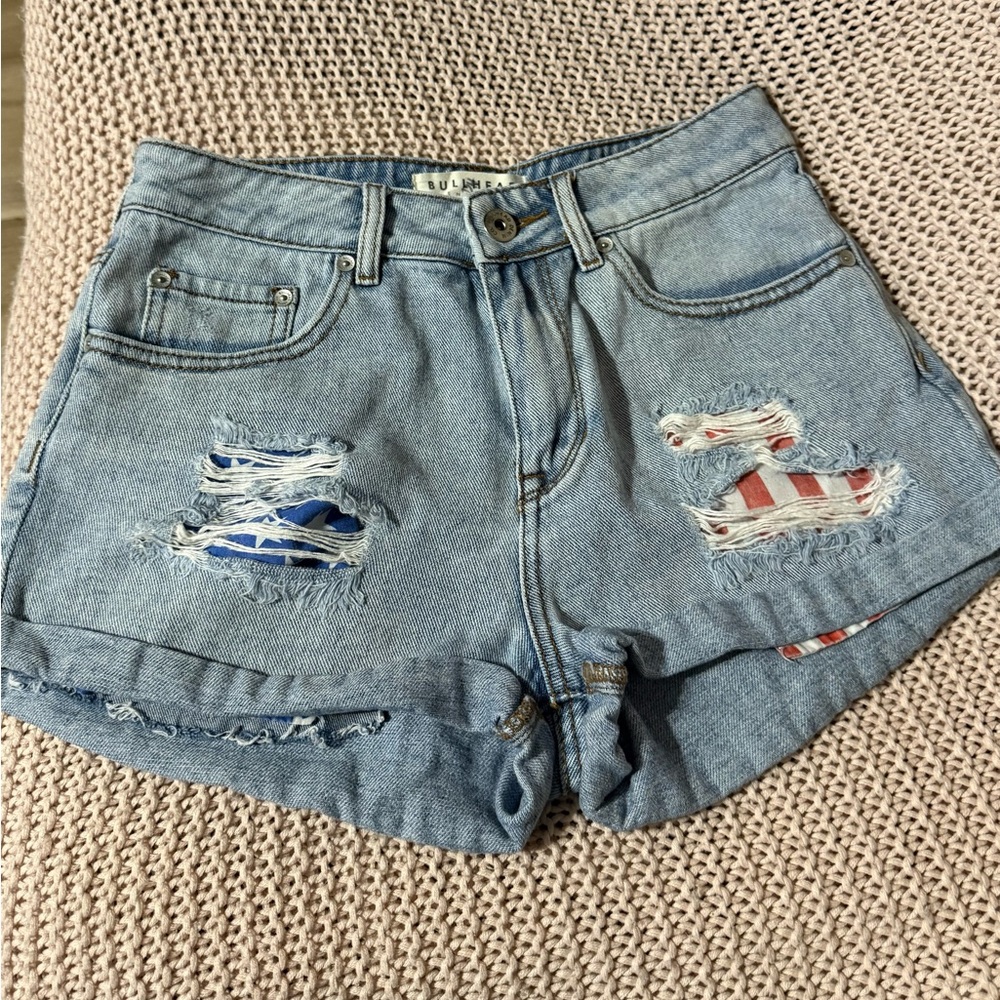 Bullhead Light Blue Ripped Jean Shorts- blue flag star and red stripes